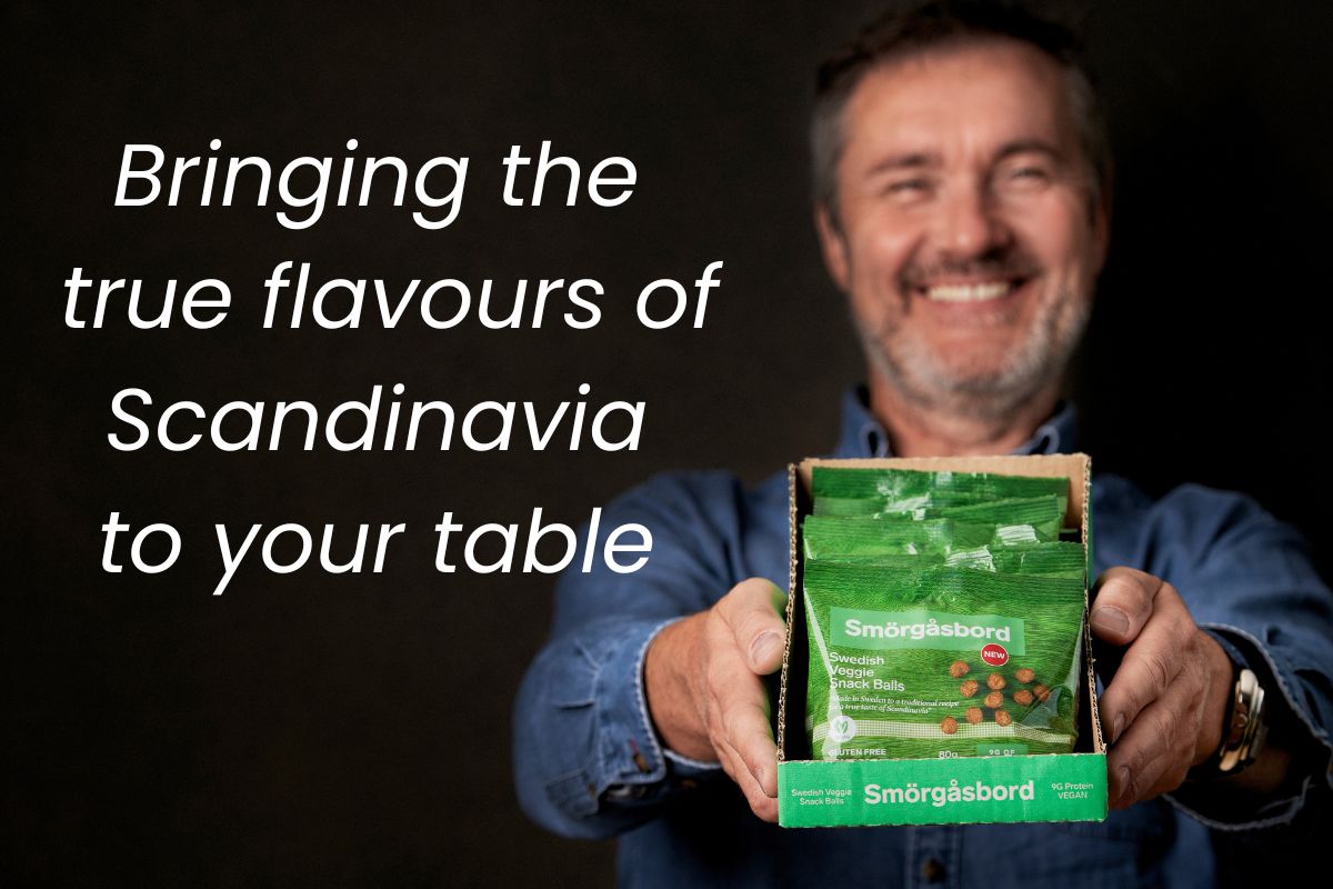 Man holding a package with text about bringing Scandinavian flavors to your table